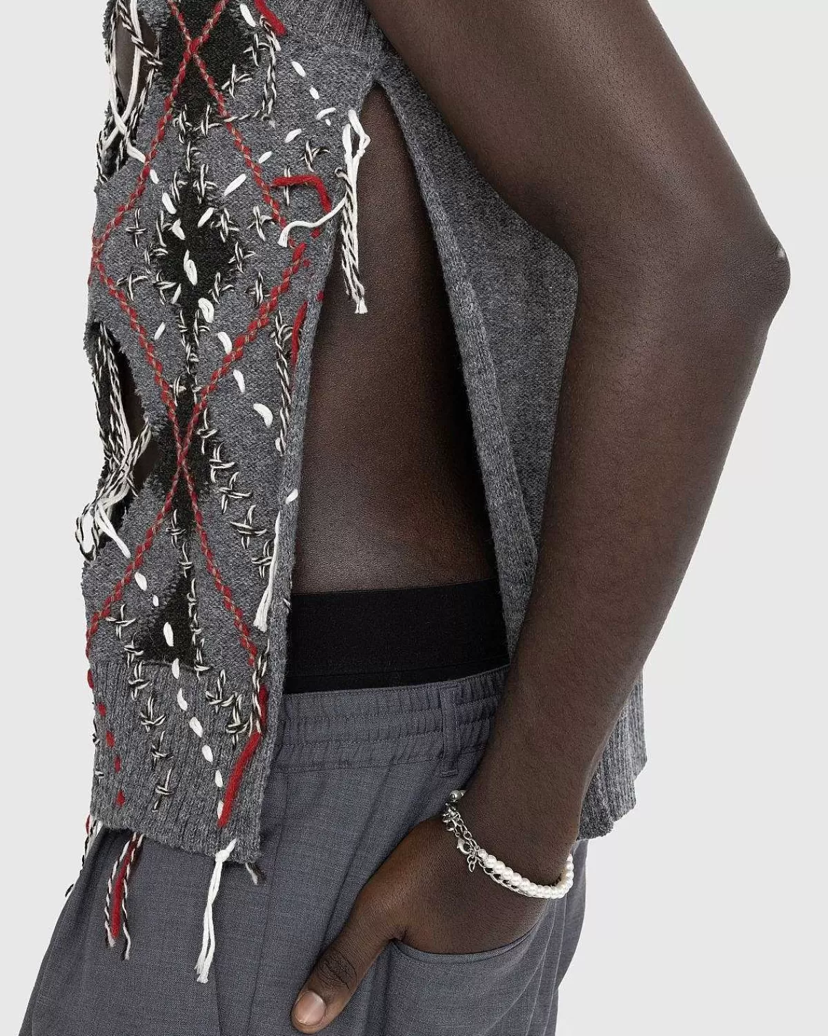 distressed_wool_sweater_vest_multi_4.webp Strik>Maison Margiela Distressed Wool Sweater Vest Multi