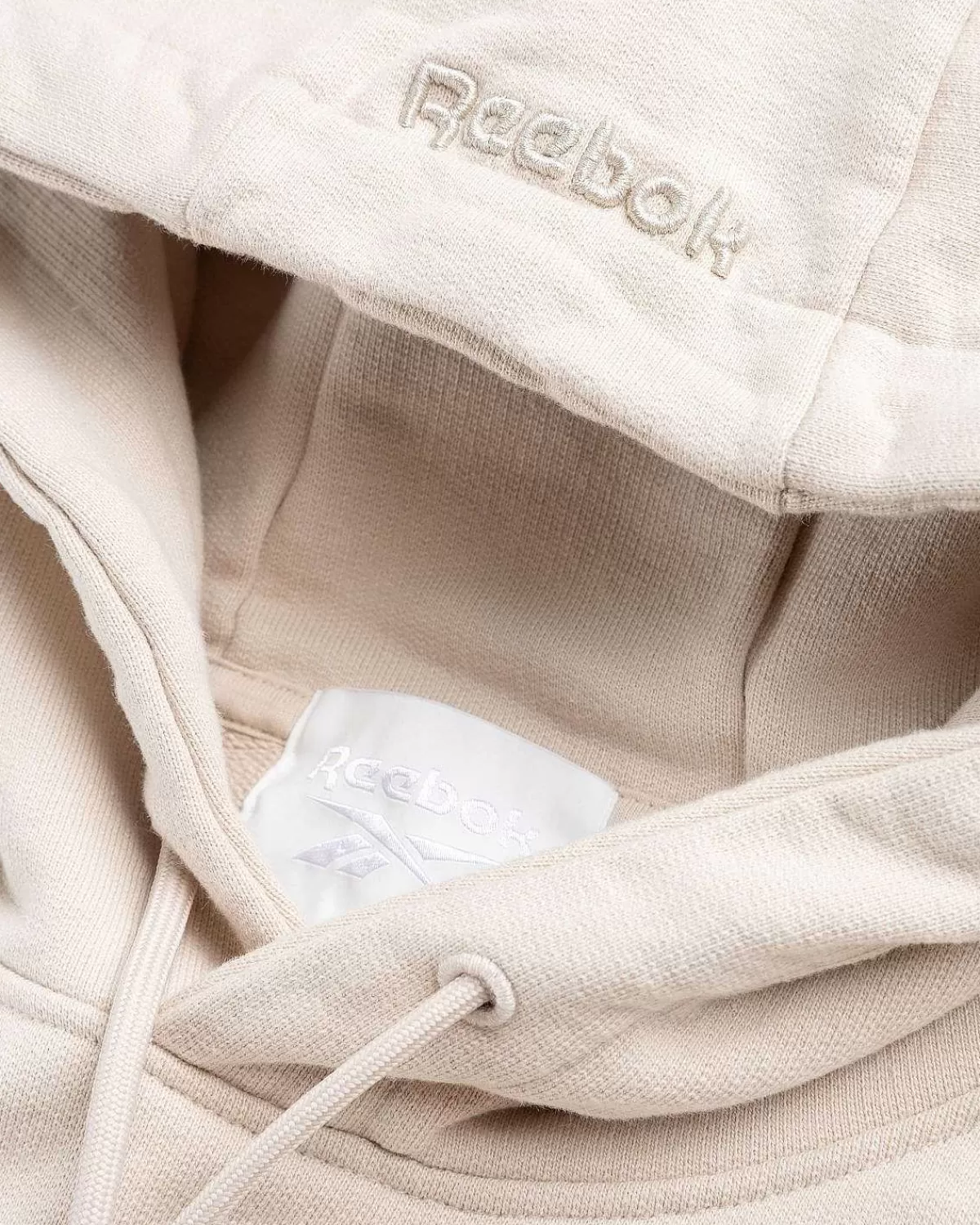 oversized_piped_haettetroje_sand_6.webp Sveder>Reebok Oversized Piped Haettetroje Sand