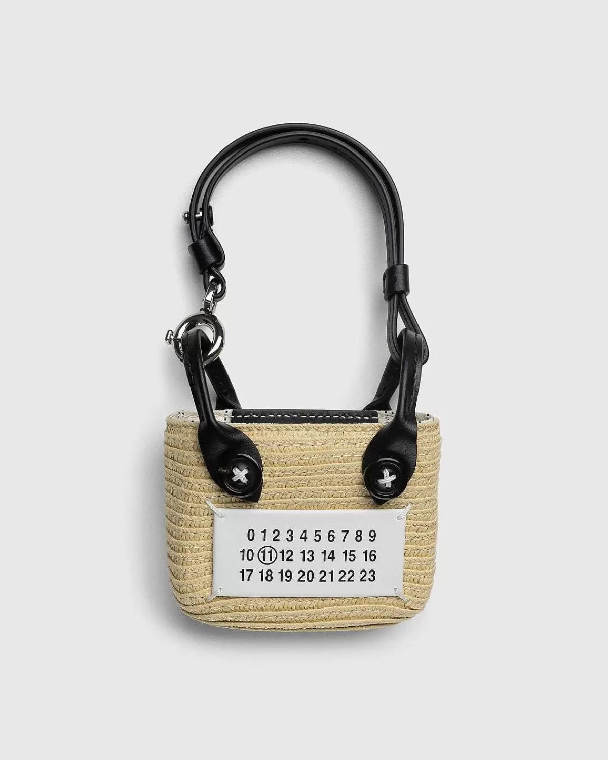 raffia_mulepose_naturhvid_1.webp Tasker>Maison Margiela Raffia Mulepose Natur/Hvid