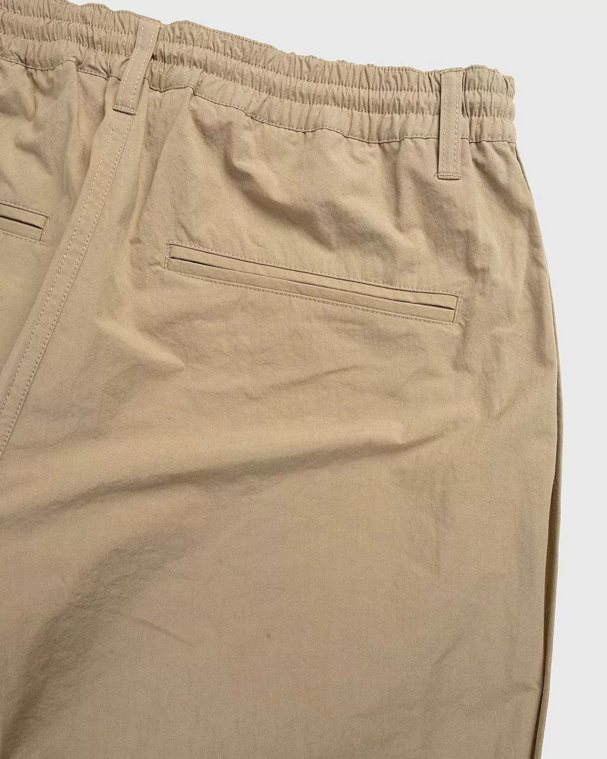 reverse_piping_elastisk_buks_beige_7.webp Bukser>Highsnobiety HS05 Reverse Piping Elastisk Buks Beige