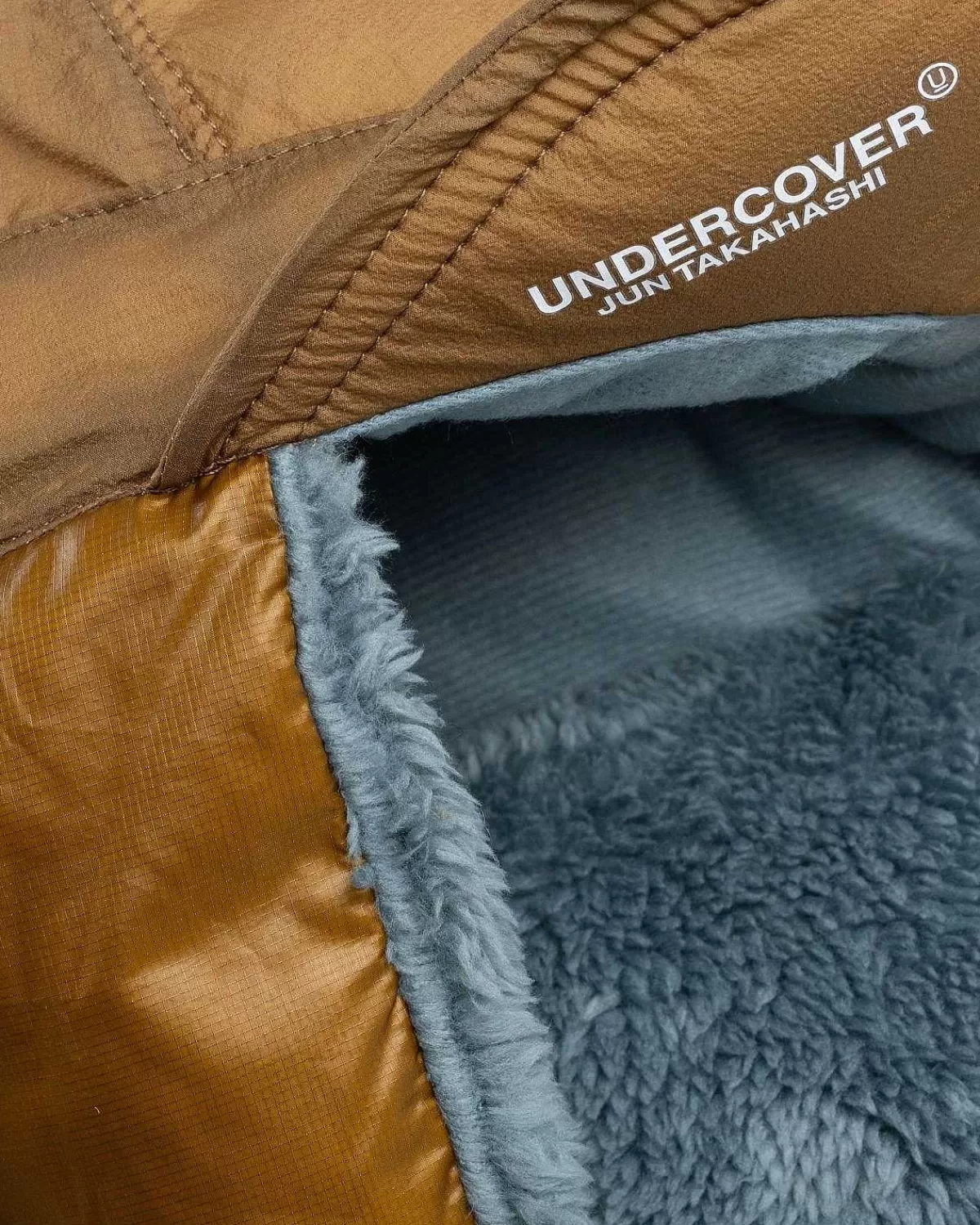 soukuu_down_cap_bronze_brunbetongra_5.webp Hatte>The North Face Soukuu Down Cap Bronze Brun/Betongra